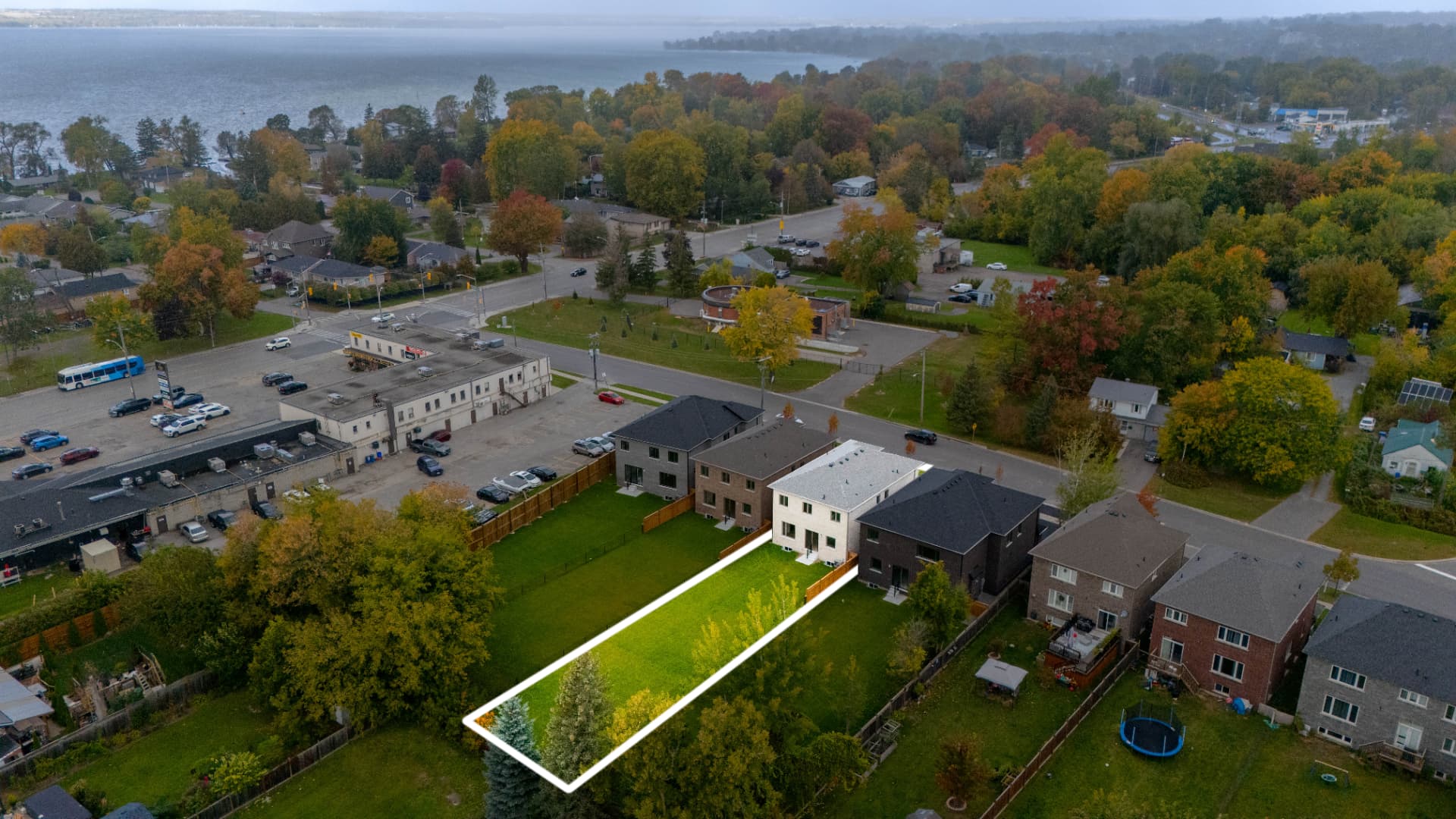 Aerial view of the property and lot