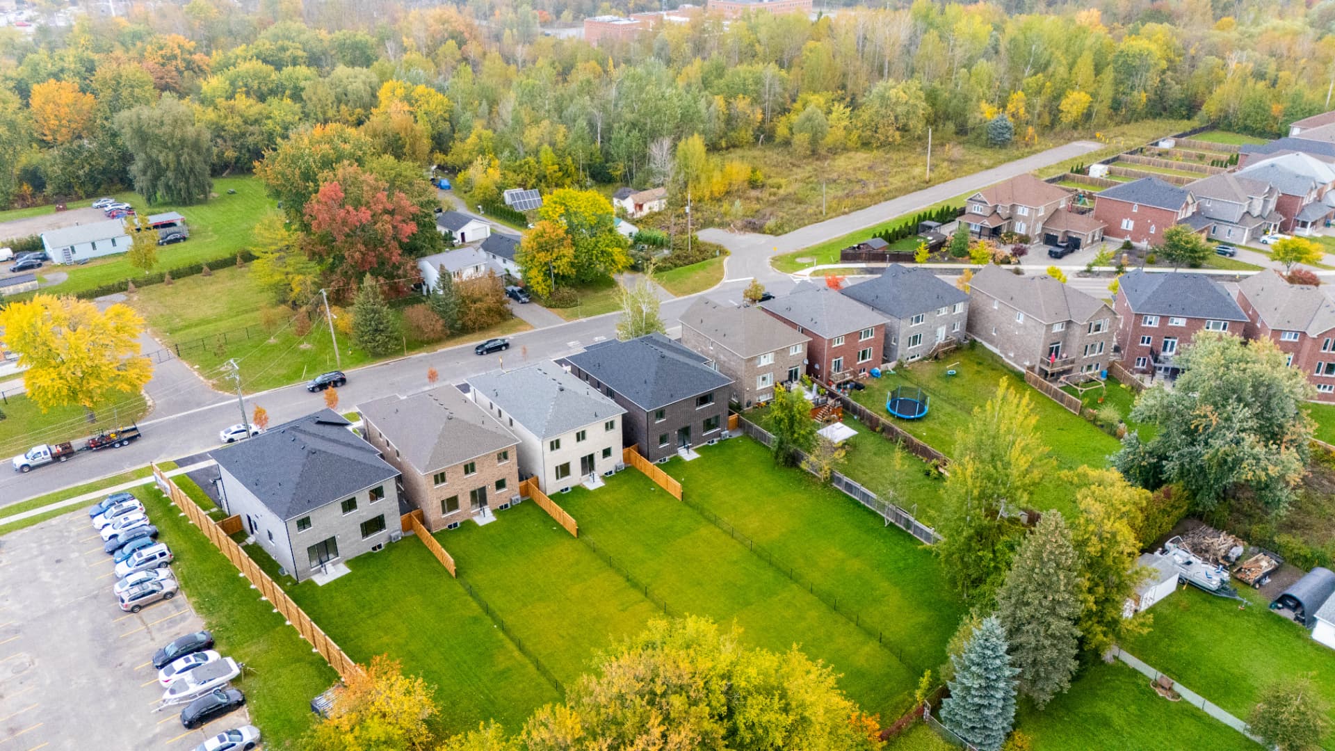 Aerial view of the property and lot