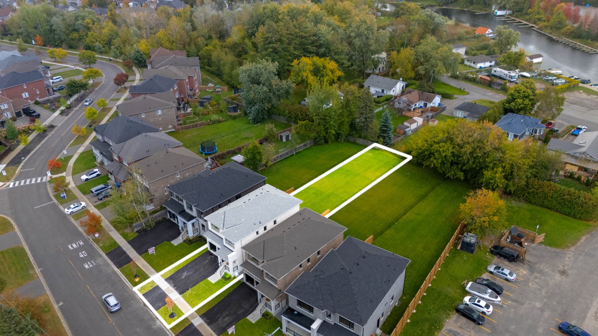 Aerial view of the property and lot